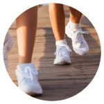 Feet walking in tennis shoes